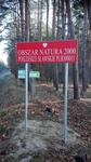 Tablica informująca o formach ochrony przyrody z nazwą obszaru chronionego Pojezierze Sławskie PLB300011